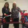 Neptune Employees pitch in to bring Christmas cheer to two local families